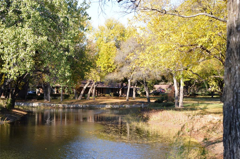 A Rare Opportunity! A beautiful, serene oasis that encompasses a pond, island and a winding creek through the 8 acre property.  Estate includes a 1975  3-3.5 (3506 sq ft) main home,  a 1965 2-1 (1965 sq ft) guest home, 3 Paddocks (851 sq ft),  a pool with large waterfall and pool house with full bath and 2 changing rooms, Koi pond with fountain and small creek leading to a Gazebo.  RV parking, 3 car garage and a separate garage for golf cart. The property has 2 water wells. The home has great bones with solid wood doors, rich wood paneling in the LV with fireplace and custom cabinetry thru-out. Great entertainment home with 2 large LV areas AND gameroom.  The bedrooms look out to pool and Koi pond with separate patios. The second home has 2 bedrooms, full kitchen and 2 very large entertainment rooms.  What a great multi-generational opportunity or rental.  Both homes could use an update but very livable as is. This is an estate like no other!  NO HOA, Plano ISD. Horses Permitted.