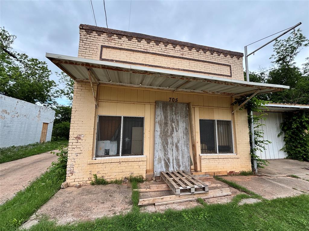 Bring your ideas to this great home — strong bones and great potential await the right investor. This property is being offered as part of a 10-property investment bundle (10 properties), available for purchase as a package or per property. Package list price: $325,000 Owner Financing Available — No Bank Needed. Seller offers flexible in-house financing on the full package or on individual units. No origination fees, no lender delays. Credit and background check required. Bundle includes MLS #21249030, #21248946, #21248936, #21248927, #21248912, #21248851, #21248837, #21248786, #21248751, and 1 commercial property: 705 N Broadway St that includes a residential property as well. All properties sold as-is. All information provided is deemed reliable but is not guaranteed and should be independently verified. Photos shown correspond to a commercial structure located within the property, in addition to a 2-bedroom, 1-bath home. Photos of the residential unit will be available ASAP.