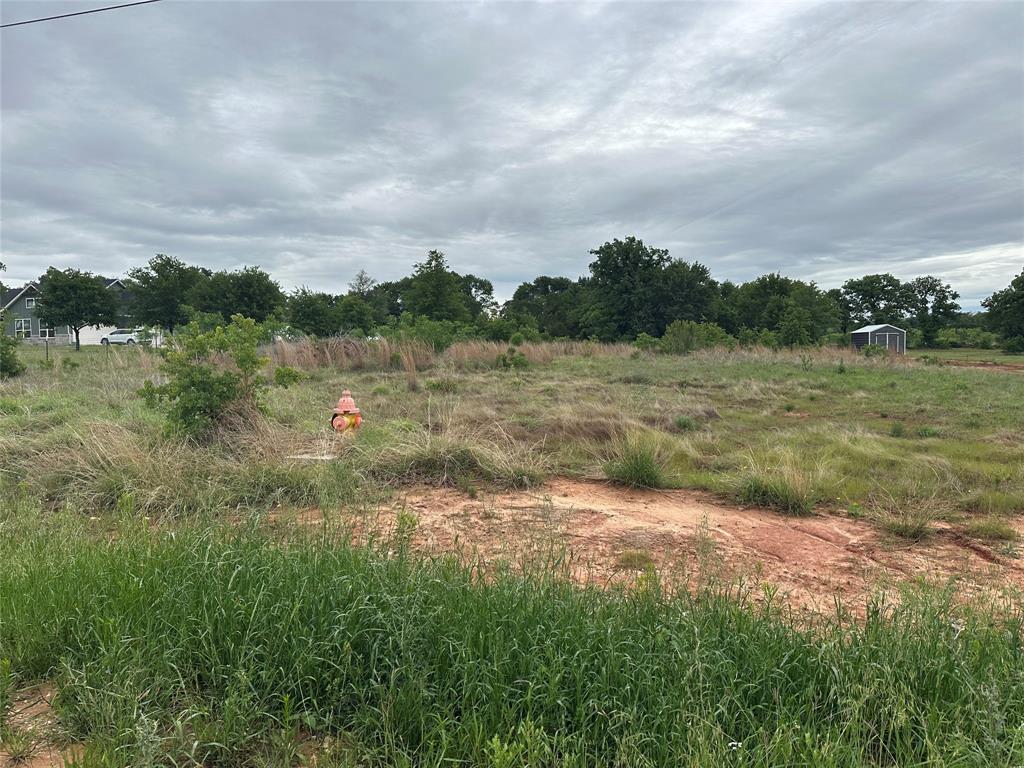 This attractive residential lot is situated on a paved county road and is perfect for building your dream home or enjoying a weekend retreat. Located just minutes from Glen Rose, it falls within the highly rated Glen Rose ISD. Both water service from the district and electricity are available. With over an acre of space, you'll have ample room for a house and a workshop.