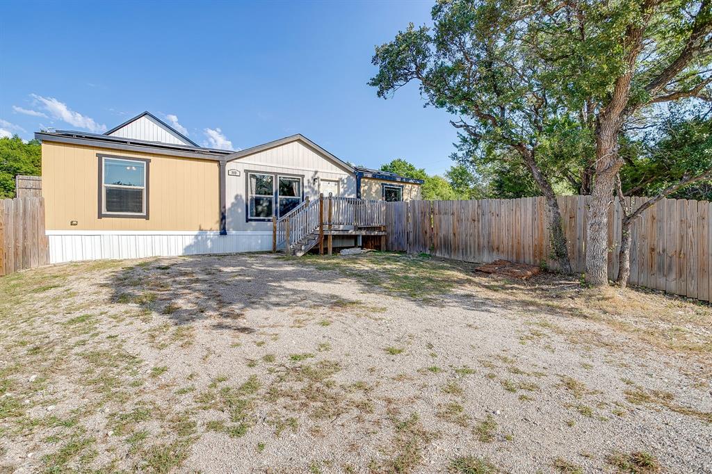 UPDATE: SOLAR PANELS WILL BE PAID IN FULL BY SELLERS AT CLOSING!
Welcome to this charming 3-bedroom, 2-bathroom double-wide home in the desirable Comanche Cove subdivision of Granbury, Texas. Offering 1,372 square feet of comfortable living space, this home provides a functional layout with plenty of room for family and guests.
Comanche Cove residents enjoy access to outstanding community amenities, including a private boat ramp, community dock, clubhouse, and refreshing pool—perfect for lake living and entertaining.
Whether you’re looking for a full-time residence or a weekend getaway near Lake Granbury, this property offers convenience, comfort, and a wonderful community lifestyle.  Washer, dryer, and refrigerator will convey with sale of property.