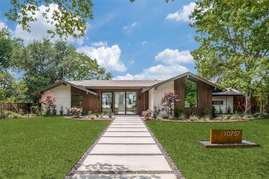 Welcome to 10757 St. Lazare, a beautifully reimagined mid-century modern home designed in collaboration with F+E Design Architects & Camara Homes. Taken to the studs, thoughtfully expanded, and completed as new construction in 2026, this 5-bedroom residence seamlessly blends timeless architecture with modern design, warm natural materials, and elevated finishes throughout.

Inside, vaulted ceilings, exposed beams, wide-plank hardwoods, and expansive windows create a bright, open feel from the moment you enter. The floor plan offers multiple living and dining spaces, including a dramatic fireplace that anchors the main living area and creates a seamless flow for entertaining. The chef’s kitchen features custom cabinetry, an oversized waterfall island, sleek stone surfaces, high-end appliances, and abundant storage.
 
The primary suite offers a true retreat, complete with vaulted ceilings, walls of windows that frame serene natural views, and direct access to a tranquil Zen-inspired outdoor shower. The spa-like bath features dual vanities, designer lighting, a soaking tub, and an expansive glass-enclosed shower.
 
Outdoors, a covered patio with wood-paneled ceilings, a fire feature, built-in grill area, and a spacious yard create an ideal setting for relaxing or entertaining year-round.
 
Ideally located in Dallas’s sought-after Private School Corridor, with convenient access to top dining, and shopping. A rare opportunity to own a fully reimagined modern home in one of Dallas’s most established neighborhoods.