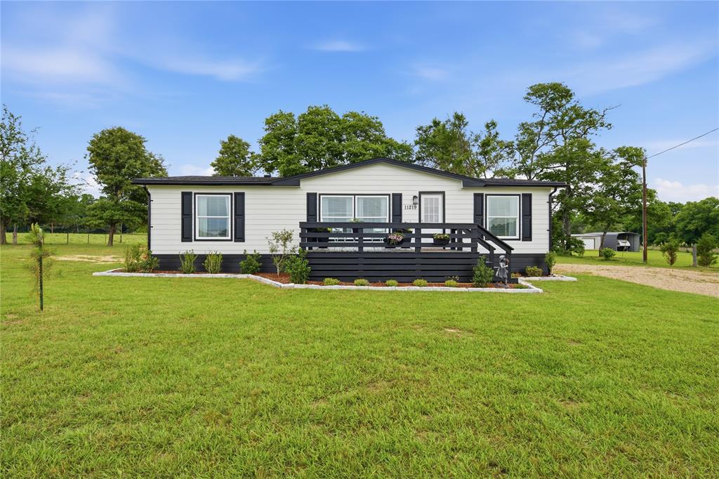 Completely renovated from the ground up, this spectacular 3 bedroom, 2 bath home sits on 2.49 unrestricted acres just 8.5 miles from Athens on FM 317. Enjoy the peace and serenity of country living while still being conveniently located near Athens and Tyler. This must-see home offers all-new finishes throughout, including all-wood cabinetry, granite countertops, new appliances, and professionally selected design details. A beautiful wood beam between the living area and kitchen and dining space adds warmth and character. Step outside to a front porch and a relaxing back area with a privacy wall and enjoy the beautiful acreage that is perfect for roaming, gardening, adding improvements, or making it your own. With no restrictions and a brand new renovation, this property offers comfort, flexibility, and country charm all in one.