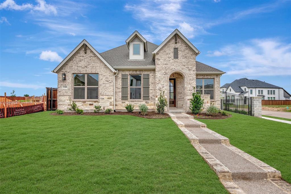 Perfectly positioned on a desirable corner homesite, this beautiful one-story home blends warmth, elegance, and intentional design. Step inside to a light-filled, open layout featuring two spacious living areas — perfect for a playroom, gameroom, or inviting second lounge along with a private enclosed study adorned with French doors, creating a peaceful retreat for working from home or quiet reflection.

At the heart of the home, navy kitchen island cabinetry makes a striking statement, adding a sophisticated pop of color to the well-appointed kitchen. The owner’s retreat offers a serene escape with a spa-inspired bath and an oversized walk-in shower designed for ultimate relaxation.

Enjoy the outdoors year-round on the expansive covered back patio, ideal for morning coffee or sunset gatherings. This home offers the perfect blend of style, versatility, and everyday luxury.