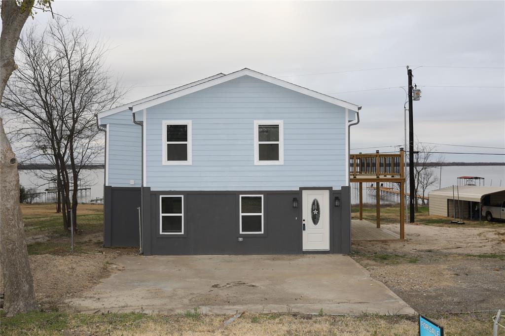 Total renovated as brand new, new roof with gutters;  ready for new owner to enjoy the lakefront with patio, docking with water and electricity.
City water, Co-op Electric, City of West Tawakoni water and sanitanion. Lot 21 next to the property also for sale on the different listing and sellers will consider selling them together. New survey available. Buyers and buyer's agents to verify all information including but not limited to any deed restrictions, zoning, unitities, septic tanks, all measurements of the rooms, lot size, pier, dock...