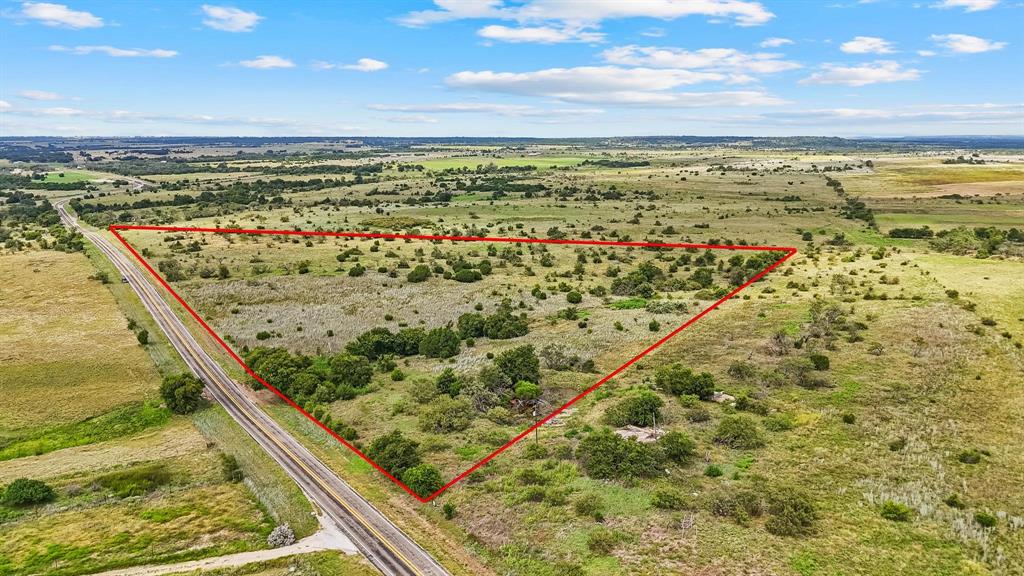 Small acreage being approximately 14.375 acres. It makes a great place for building your forever home or just a weekend away. It is located off paved frontage about 12 miles out of Hamilton. The electricity is already in place and ready to go. A few good building sites with a view and the potentional for a tank to be built. Native pasture and scattered trees with a rolling terrain. It has an ag exemption already in place. Call to take a look!