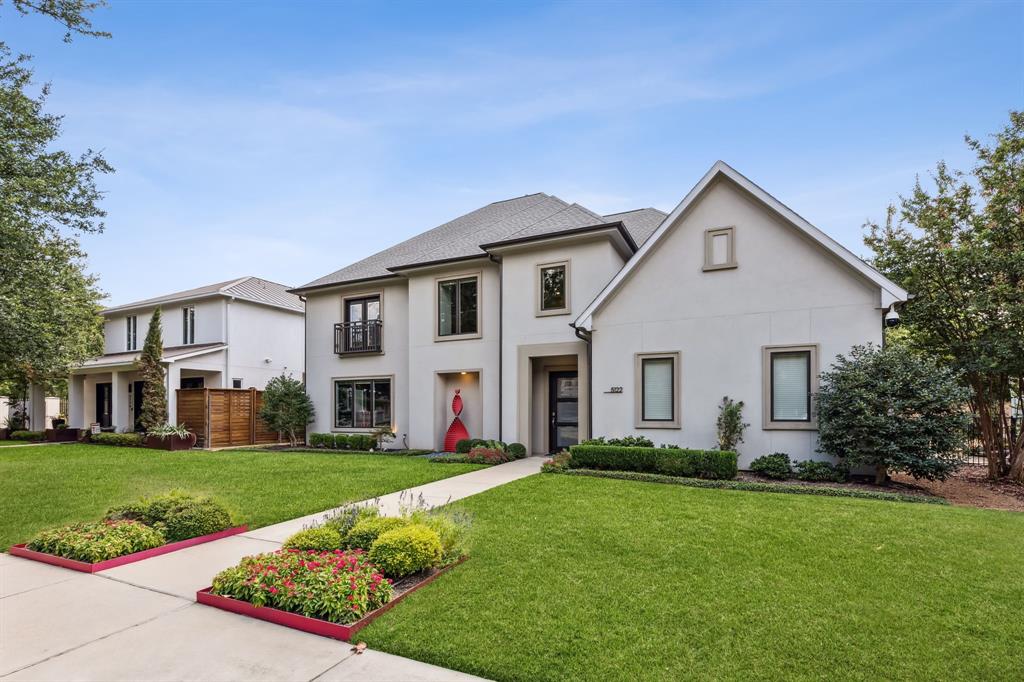 This stunning custom-built transitional received a new roof December 2023 with transferable warranty. The floor plan is spacious & inviting which seamlessly blends living spaces for a harmonious flow throughout. A home automation system controls lighting, TV, HVAC, & security. Wood floors grace the interior & you’ll find art walls perfect for showcasing your unique art style. The kitchen is a masterpiece with built-in refrigerator & freezer, Miele steam oven, warming drawer & 6-burner gas cook top with griddle. The temperature-controlled wine room accommodates up to 300 bottles. The primary suite & office are located on the first floor, 3 en-suite bedrooms & game room are upstairs. Outdoor living offers an expansive covered & heated patio with kitchen. Relax in the pool & enjoy the water feature & gas torch urns, creating a tranquil oasis. There is natural turf in the front & artificial turf in the back yard.  The gated drive leads to a 3-car garage & can also double as a sport court.