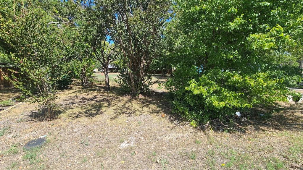 Unlock the possibilities with this nearly half-acre gem nestled in a charming, established neighborhood just minutes north of Hwy 380! Whether you're envisioning a cozy retreat or a spacious family haven, this lot offers the perfect canvas for your dream home. Enjoy the convenience of nearby amenities while savoring the peace of a residential setting. With plenty of room to bring your vision to life, the potential here is endless. Just be sure to check local city guidelines to keep your build smooth and stress-free. Opportunities like this don’t come around often—make it yours today!