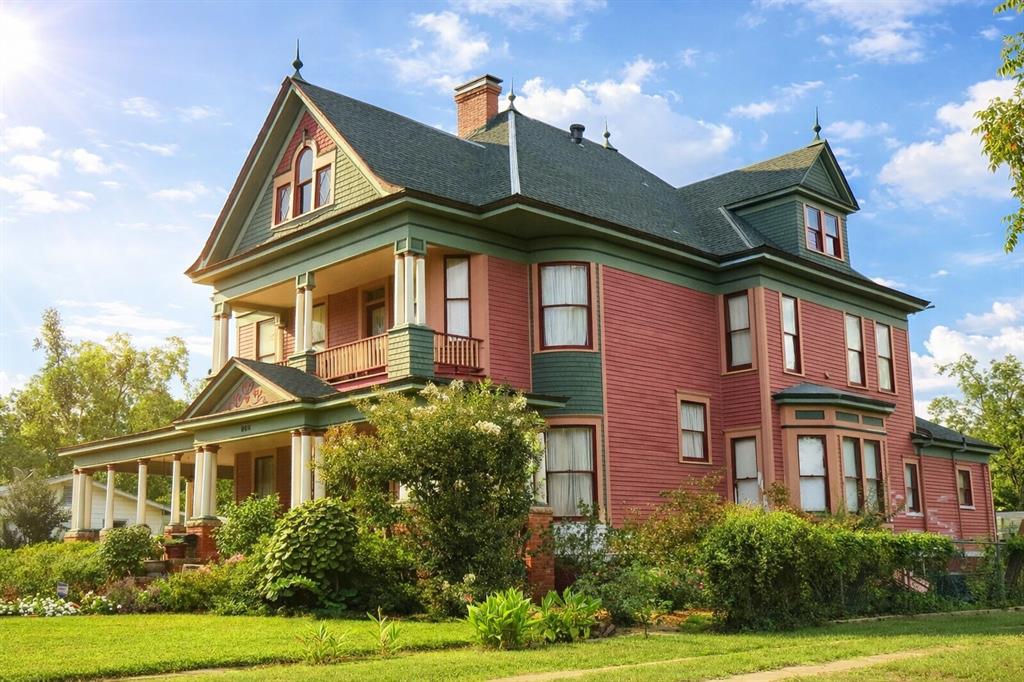 MOTIVATED SELLER
This gem was built in 1890, The Era of the Gilded Age. A beautiful historic home blends timeless Victorian character with modern comfort. Original hardwood floors, tall ceilings, and classic architectural details highlight the home’s charm, while thoughtful updates enhance everyday livability. The functional layout offers inviting living spaces, an updated kitchen with ample cabinetry, and flexible bedrooms ideal for guests, a home office, or creative use. Enjoy a covered porch, detached garage with storage, and a spacious backyard perfect for relaxing or entertaining. Located in a central Paris location with convenient access to downtown shopping and dining. A rare opportunity to own a piece of history with modern appeal. This property is on the registered list of historical homes. 
4 bedrooms upstairs. 2 bedrooms have a fireplace in them and one bedroom has access to a balcony by a private door. 

Please see survey for full value of land on this property. This property sits on over an acre. Adjoining lot is also available for sale making this property over 2 acres total.