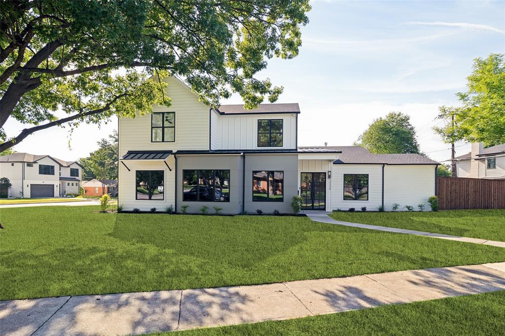 Built in 2025, this striking modern residence blends clean architectural lines with warm, livable design across an open and thoughtfully curated floor plan. Offering 5 bedrooms, 4 bathrooms, a dedicated media room, and a 2 car garage, the home was designed for both elevated entertaining and everyday comfort.
Wide plank hardwood floors, soaring ceilings, expansive windows, and dramatic open spaces fill the home with natural light. The chef's kitchen anchors the main living area with a large waterfall island, custom cabinetry, premium appliances, and a beautifully integrated wet bar with wine storage. Oversized sliding glass doors create a seamless connection to the covered outdoor living area and fully equipped outdoor kitchen.
A sculptural floating staircase adds a striking architectural focal point, while the spacious media room offers the perfect retreat for movie nights or game days. Every detail was carefully considered, creating a home that feels modern, refined, and effortlessly functional.