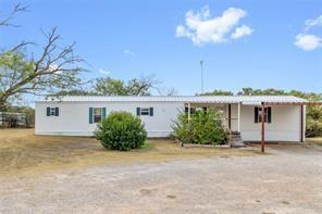 FINALLY get to be a land owner! Acreage in either Early ISD or Blanket ISD, located close to Early. Land is great for horses or cattle, 2 connected stock tanks, multiple barns and horse stalls and a chicken coop. Well maintained manufactured home with metal roof in great shape, new siding, recent repairs and some new flooring, and an RV hookup by house. House has 3 bedrooms, 2 full baths, laundry room, and open concept kitchen, dining and living area. Beautiful master bedroom and master bath with a garden tub. 2 spare bedrooms, one with beatiful bay windows. Master Bedrooms has large walk in closet!!1 LOTS of storage in kitchen!! Come walk the land of your future farm or ranch home. MH LABEL# HWC0280112