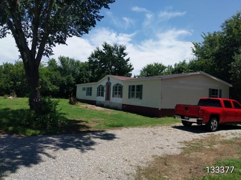 Welcome to this Ample Doublewide situated on a 2 Acre lot. New HVAC, New plumbing, New flooring.