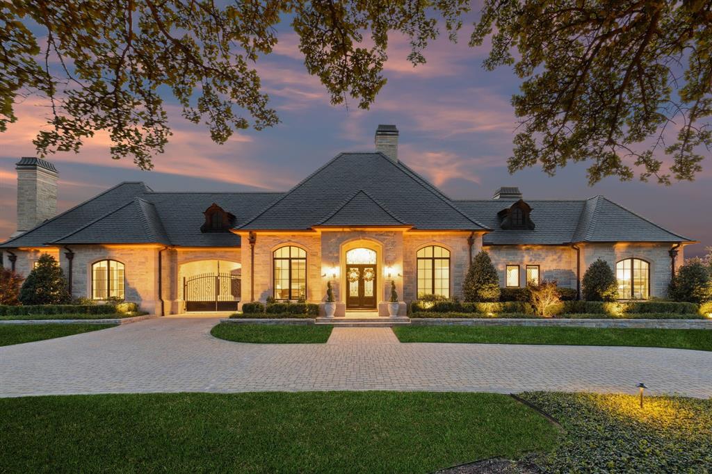 Welcome Home to this impeccable ONE Story, 8 CAR garage home in the Exclusive Guard Gated neighborhood of Quail Hollow, Westlake!  Perfectly custom designed for elegant entertaining & everyday living, this home boasts European inspired stone exterior design, highest end of custom finishes, exquisite hardware, wood + marble flooring, custom designed draperies throughout. Welcome your guests through the impressive circular drive to a grand Foyer and Executive Study. The open plan Great rm area, boasts a warm Family rm w a beautiful cast stone fireplace & a wall of sliding Pella doors that brings the outside in. The spacious sunlit Dining rm also has sliding Pella doors to the outdoor liv & kitchen area. The Chef's Kitchen is a Dream, w top of the line appliances, custom designed stainless steel vent hood + huge island perfect for gathering. Adjoining the Kitchen you will find a fully equipped Prep Kitchen for all your entertaining needs. Enjoy the evening in the large Family Game rm complete w Wet Bar & separate Media rm for your home viewing enjoyment. The Primary Suite is stunning w designer finishes + custom ceiling plaque molding, marble floors & laser cut accents, spacious Spa Bath & 2 large custom Closets. Two Additional Bedroom Suites enjoy lovely bathrooms & walk-in closets. Guests will never want to leave once they enter the private Casita - Guest Quarters w banquette Dining area, Kitchenette, Liv Room w fireplace, luxury hotel quality Bdrm suite & Bath. Step outdoors to enjoy an expansive screened Liv area w fireplace + Din area & Outdoor Kitchen featuring a large grill, sink, storage & gas Pizza Oven! Enjoy your own Orchard w 22 producing Fruit trees & a working organic garden w raised beds. Tons of grass for everyone to run & play, plus mature trees. Thermally efficient w Pella windows & doors, plus full foam encapsulation. Laundry room accommodates dual washers & dual dryers. Incredible 8 Car tandem Garage w high ceilings, epoxy floors & tons of storage!