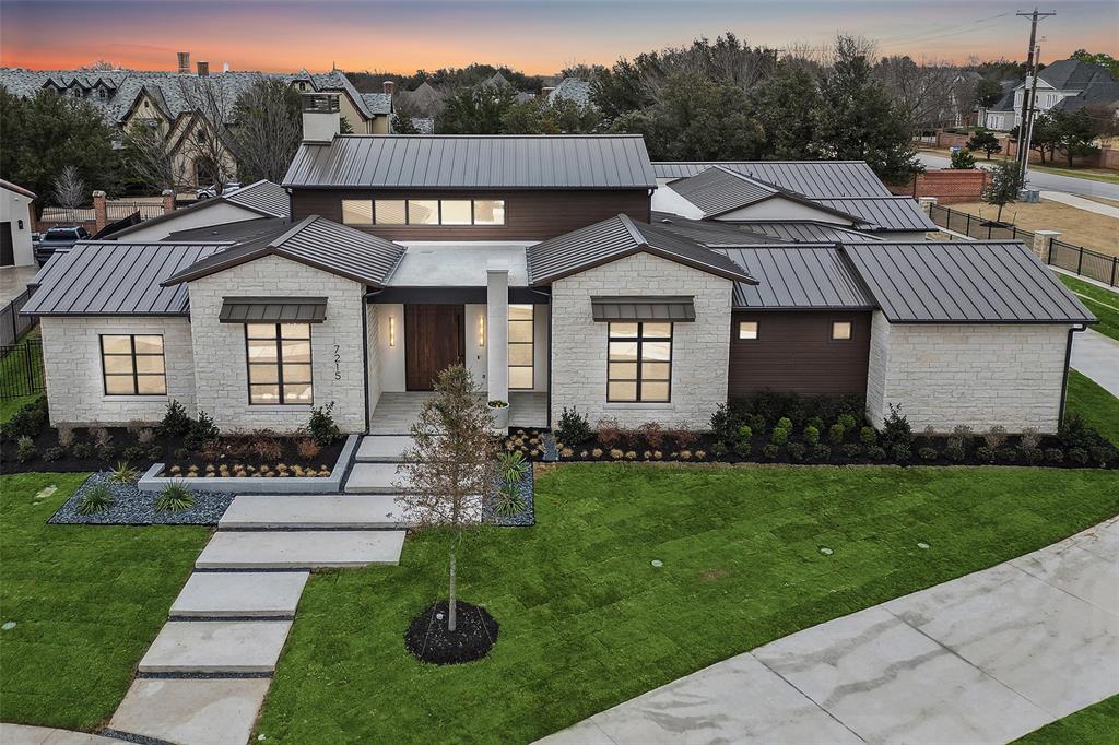 Beautiful hard to find single story built by Heritage Custom Homes. Located in the new gated Oak Alley Estates in Colleyville. This sleek and stylish home offers the perfect combination of contemporary design and luxury living. Upon entering the home through the solid walnut pivot door, you will immediately step into the open-concept living with designer finishes, a floating granite hearth fireplace and abundant natural light. Private owners retreat, spacious spa-like bathroom with soaking tub and custom walk in closet. All guest bedrooms have full ensuite baths. Beautiful executive study off main living space with double glass walls. Large game room perfect for entertaining with sliding door to outdoor covered patio. Chef's Kitchen with stainless steel appliances including professional grade 48 in gas range, 60 in Thermador refrigerator freezer and wine fridge, prep kitchen with sink, ice maker and second dishwasher. Custom heated pool designed and built by Leschber Designs.
