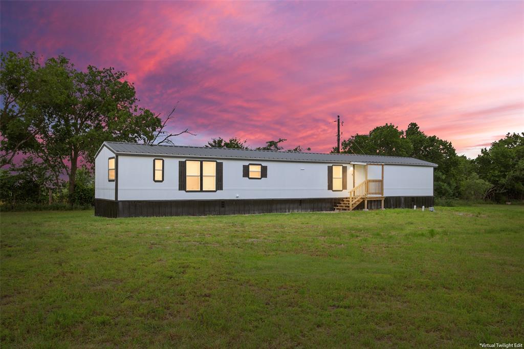 Freshly remodeled 3-bedroom, 2-bathroom manufactured home on approximately one acre in Limestone County. Final boundaries to be determined by survey.

The primary suite includes a double vanity, garden tub, and separate shower. Dedicated laundry room. Stove, refrigerator, and dishwasher convey. Septic and HVAC both under two years old.

Corner lot in a peaceful, quiet rural setting. A blank canvas with no known deed restrictions and room to make it yours.