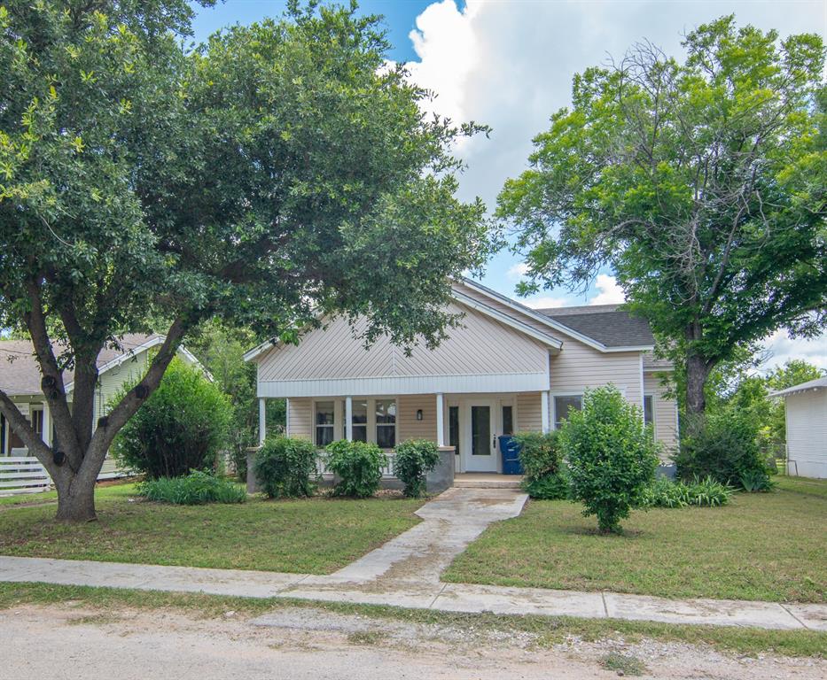 Discover the charm of this beautifully maintained older home, perfectly situated in a mature neighborhood filled with restored and updated properties. This residence blends classic character with modern comfort, featuring updated plumbing, electrical, and new interior HVAC units, along with two separate HVAC zones for efficient climate control.
Step inside to find updated bathrooms and a stylish kitchen complete with granite countertops, an upgraded sink, and a modern faucet. The home offers a warm mix of original hardwood floors, carpet, and vinyl, and is filled with natural light thanks to its many windows.
Relax and unwind on the spacious front porch, the ideal spot for morning coffee or a refreshing glass of iced tea. Outside, the driveway leads to a three stall detached carport, providing ample covered parking.
This inviting property is ready to tour — contact me to schedule your personal showing.