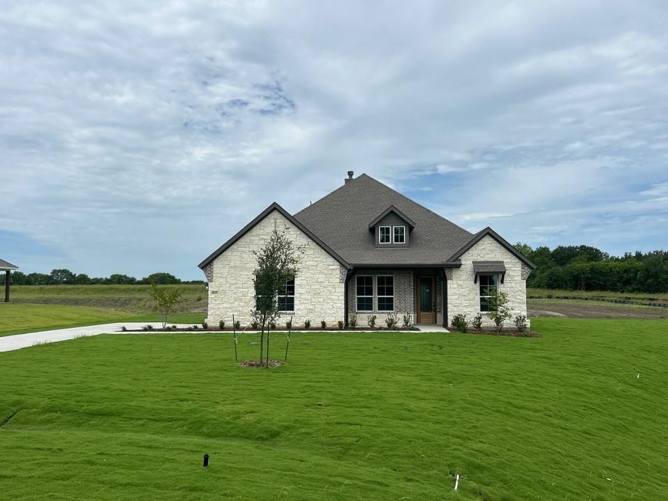 Estimated June 2026 completion! Ask us about our Trade In Trade Up program, we can buy your home!: Step into the Bluebonnet by Riverside Homebuilders and embrace a lifestyle of comfort and functionality. With 4 bedrooms and 3 bathrooms sprawled over 2,686 square feet, this single-story haven offers ample space for every member of the family. As you enter through the inviting porch, the airy foyer sets the tone for the home's open layout. To the left, a flex room awaits, beckoning to be transformed into your ideal space—whether you envision a home office, gym or hobby room. Continue through the foyer to discover the heart of the home—a luminous dining room bathed in natural light. Beyond lies the main living area, a seamless fusion of the expansive kitchen, cozy family room featuring a fireplace and a charming nook adorned with picturesque windows. On the right wing of the home, privacy awaits with three traditional bedrooms and a breathtaking owner's suite. The owner's retreat boasts a spacious walk-in closet and a spa-like bathroom, offering a sanctuary for relaxation. Convenience is paramount with the laundry situated just off the bedrooms, accompanied by a mud bench near the garage entrance. To embrace the beautiful DFW weather without having to leave your home, step outside to the generous covered patio—where endless possibilities for outdoor enjoyment await. With its thoughtful design and inviting atmosphere, the Bluebonnet embodies the epitome of charming Texas living for all families alike.