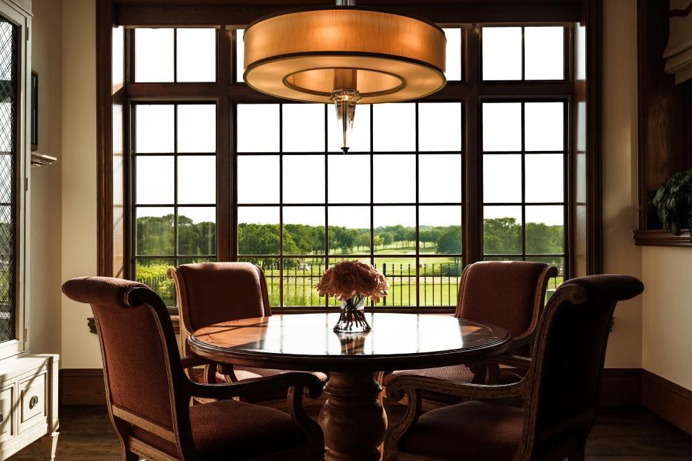 Behind the gates of TPC Craig Ranch, this extraordinary custom Mike Peckham estate blends architectural artistry, cutting-edge smart-home technology, and panoramic golf course living. Perfectly positioned along the fairways, the residence was designed for those who value elevated design, privacy, and effortless entertaining. 

Spanning approximately 4,265 square feet, the home offers 3 bedrooms, 3 full baths, 1 powder bath, a private study, elevator access to both levels, and seamless indoor-outdoor living spaces. From the moment you step through the handcrafted architectural glass doors by acclaimed artist Linda Lubinsky, every detail makes a statement - groin vaulted, barrel vaulted, and coffered ceilings, intricate hardwood and polished marble flooring with custom inlays, dramatic designer lighting, bespoke millwork, and a stunning marble staircase create an unforgettable first impression. 

The chef's kitchen features Sub-Zero refrigeration, a Wolf range, Viking double ovens, a built-in Scotsman ice system, oversized pantry, and custom soft-close cabinetry. Expansive living and dining areas open to a resort-style outdoor retreat complete with a covered lounge, fireplace, integrated television, outdoor kitchen with premium Lynx grill, fountain, pergola seating area, and breathtaking views overlooking TPC Craig Ranch. 

Luxury continues throughout with a library featuring a rolling ladder, custom built-ins, concealed storage, motorized shades and drapery systems, designer fireplaces, and a private primary suite offering a balcony overlooking the course, an expansive spa-inspired bath layout, oversized walk-in closets, and bespoke millwork. 

Fully integrated with a Control4 smart-home system, whole-home audio, enterprise-grade networking, security and surveillance, this residence also includes RainSoft water filtration, Toto Washlet smart toilets, central vacuum system, golf cart garage, and professionally designed landscaping.