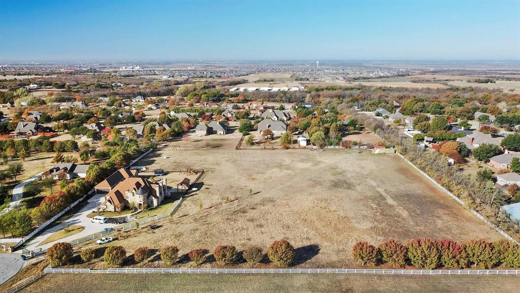 RARE OPPORTUNITY - THE LAST ESTATE LOT AVAILABLE TO BUILD IN Oxford Farms! This stunning almost 3 acre lot is fully prepped and ready for you to build your dream custom home! NO HOA, NO timeline to build, NO required builder! The land is flat and open with beautiful surrounding trees, offering the perfect blend of space, privacy, and nature. Whether you're envisioning peaceful country living, unforgettable gatherings under the Texas sky, or space for all your hobbies, this property has it all. There's plenty of room for horses, RVs, boats, or even a car collection. Enjoy the best of both worlds: quiet rural charm with city convenience. Ideally situated near Frontier Parkway and Preston Road, with quick access to the Dallas North Tollway, shopping, dining, and entertainment. Located in the highly sought-after Prosper ISD. Opportunities like this are disappearing fast, don’t miss your chance to build the lifestyle you’ve always wanted.