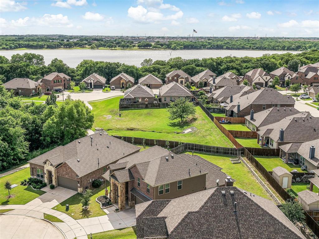 Discover the best lot in the neighborhood—just steps from the lake and scenic walking trails! Say goodbye to cookie-cutter living and hello to a home filled with thoughtful upgrades and stylish touches.

Tucked away in the most charming cul-de-sac, this oversized lot gives you space to spread out and truly enjoy life. Inside, sunlight pours through the windows, highlighting the beautiful light fixtures and the airy, open layout. The spacious kitchen and dining area are perfect for hosting friends and family, complete with a stainless gas cooktop for all your culinary adventures.
Unwind in the generous primary suite, your own personal retreat featuring a separate shower and relaxing garden tub. Head upstairs to find a large game room with newer carpet—ideal for movie nights, hobbies, or playtime. With three additional bedrooms and two full bathrooms, everyone gets the comfort and privacy they need.

This home has everything you’ve been looking for—come see it for yourself!