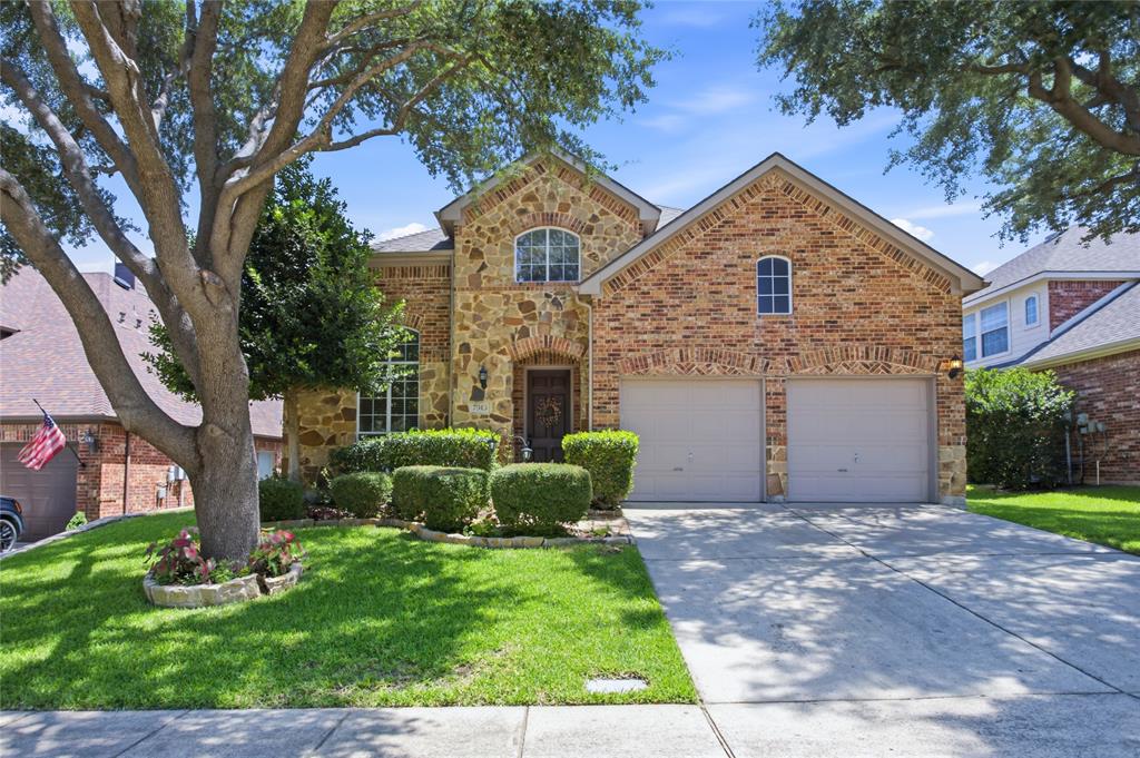 Situated on a desirable north-facing lot, this beautifully crafted home welcomes you with a soaring two-story entry, custom stone archway, and wrought-iron staircase. Travertine tile with decorative inlay, hand-scraped hardwood floors, extensive crown molding, and custom stonework create a timeless sense of craftsmanship throughout the home’s 3,066 square feet.
The spacious living room is highlighted by a floor-to-ceiling stone fireplace and opens seamlessly to the kitchen, creating an ideal layout for gathering with family and friends. The kitchen features dark granite countertops, custom glazed cabinetry, stainless steel appliances, a gas range, and a movable prep island that provides added flexibility for meal preparation and entertaining.
Upstairs, the dedicated media room comes fully equipped with a ceiling-mounted Sony projector, oversized projection screen, and built-in surround sound, all included with the home. Four bedrooms and three-and-a-half baths provide comfortable accommodations with room to grow, work, or host guests.
The backyard is a true private retreat featuring a deep freeform pool with a waterfall feature, flagstone decking, mature shade trees, lush tropical landscaping, and a built-in stone gas grill. Tucked away on a quiet cul-de-sac, the outdoor living space offers exceptional privacy and is perfectly suited for year-round enjoyment.
Located in highly sought-after Stonebridge Ranch, residents enjoy access to the Beach Club, Aquatic Center, community pools, parks, lakes, and miles of trails, with golf and country club amenities available through Stonebridge Ranch Country Club membership.