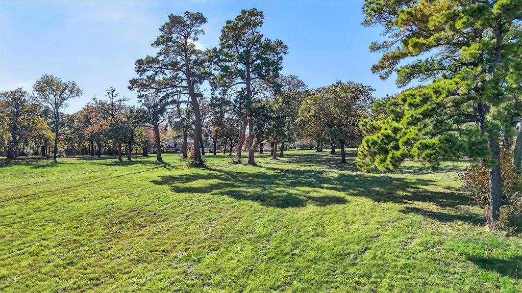 Situated directly along FM 120 and just moments from the on-ramps of U.S. Highway 75, this property offers an exceptional opportunity to secure acreage in one of Denison’s most visible and connected corridors. This property places you literally at the edge of the region’s main artery—where local traffic, regional commuters, and pass-through travelers converge—providing unmatched exposure and accessibility. FM 120 functions as a key connector between Highway 75, downtown Denison, Lake Texoma traffic, and surrounding commercial nodes, making this site ideally positioned for retail, service, office, mixed-use, or future development. With established businesses nearby and constant traffic flow feeding directly past the property, this location captures attention while remaining effortless to access. Whether envisioned as an immediate development site or a strategic long-term investment, this tract offers the rare combination of frontage, proximity, and growth potential that defines truly valuable highway-adjacent real estate. This property may be purchased individually or in conjunction with the adjacent residential property, offering a rare opportunity to combine highway-frontage land with nearby residential use for added flexibility and long-term value. This unimproved parcel is available individually or in combination with the neighboring residence (MLS #21134882), creating a rare opportunity for a turnkey homestead, compound, or future expansion.