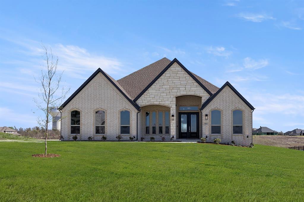 MLS# 21202367 - Built by First Texas Homes - Ready Now! ~ Discover this stunning single-story home offering 3,191 sq ft of luxurious living space on a spacious 1-acre lot backing to a private pond. Soaring 12-foot ceilings create an open, airy feel throughout. The gourmet kitchen features custom cabinetry and a built-in wine rack, while the family room and primary bedroom include elegant built-ins. Enjoy seamless indoor-outdoor living with a covered patio and tri-fold sliding door. With 4 bedrooms, 3 bathrooms, and a 3-car garage, this home blends comfort, style, and functionality. Schedule your tour today!