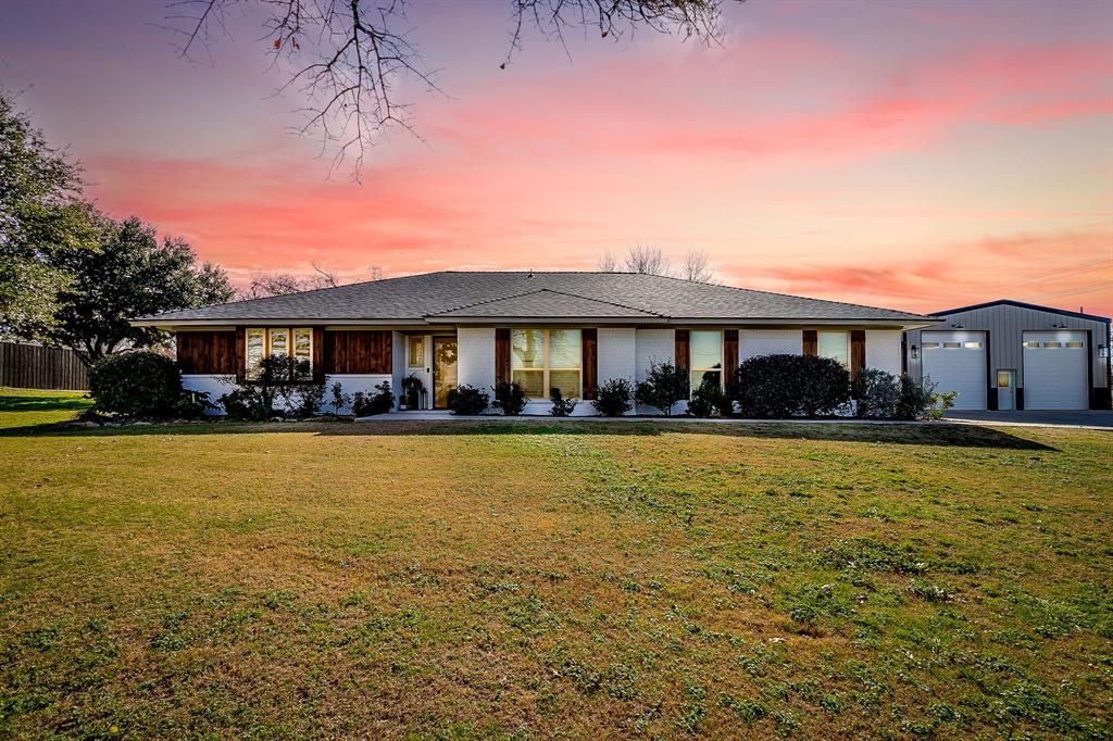 Welcome to a rare Burleson retreat where luxury updates, outdoor living, and nearly an acre of space come together in one beautifully reimagined single-story home. Set on approximately 0.99 acres, this 4-bedroom, 2-bath residence offers the privacy and flexibility buyers want, with the polished finishes and entertainer-friendly layout that are hard to find. Inside, natural light fills the living spaces and highlights the warm finishes, updated windows, and comfortable flow throughout the home. The kitchen opens easily to the main living and dining areas, creating a functional setup for both everyday living and hosting. Thoughtful updates, timeless character, and single-story convenience make this property stand out from typical suburban inventory. Step outside and the lifestyle really opens up. The custom patio, covered outdoor kitchen, and pool create a true backyard destination designed for entertaining, relaxing, and enjoying the wide-open feel of country-style living without giving up access to city conveniences. With room to spread out and no cramped lot lines, this property delivers the kind of space and privacy that buyers in this segment are actively searching for. Updates include: engineered wood floors and tile, kitchen remodel(2021), primary bath remodel(2021),Plumbing updates and 2nd bath updated(2021), electric panel updated(2021), exterior renovation(2024), custom patio, 4ton heat pump AC system, windows replaced, attic insulation, class 4 hail impact roof (2025), replaced aerobic septic system(2024), new concrete driveway and walkway. Please see documents for shop details and all other upgrades to this property as the list is extensive. Pre-approval required prior to showing