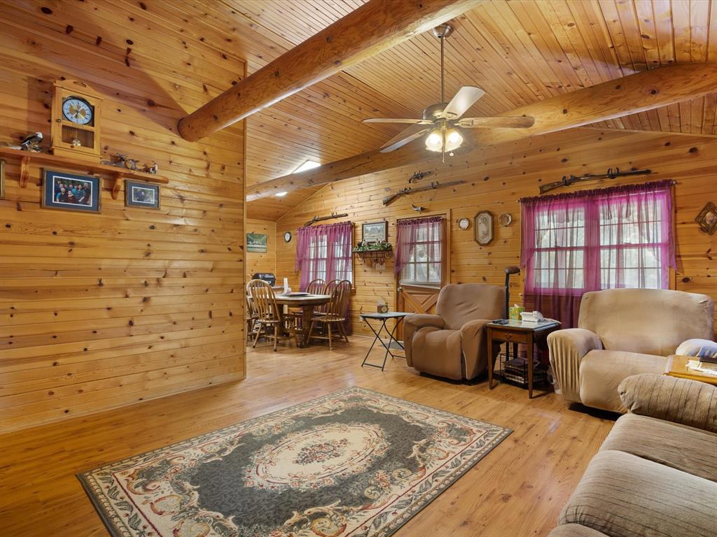 Nestled amidst the natural beauty of Chico, Texas, this timeless log home offers a unique blend of rustic charm and modern convenience. Built in 1985, this retreat is a testament to enduring craftsmanship, featuring classic wood walls and a host of updated amenities. There are three comfortable bedrooms and two bathrooms in this home, providing ample space for rest and relaxation. The wood accents continue into the bedrooms, maintaining the log home's character throughout. This property also features a 24X24 detached shop and a HUGE 20x50 barn. Don't miss the opportunity to own this exceptional home in Chico, TX. It's a chance to experience a timeless lifestyle with modern comforts. Contact us today to schedule a viewing and make this rustic retreat your own.
