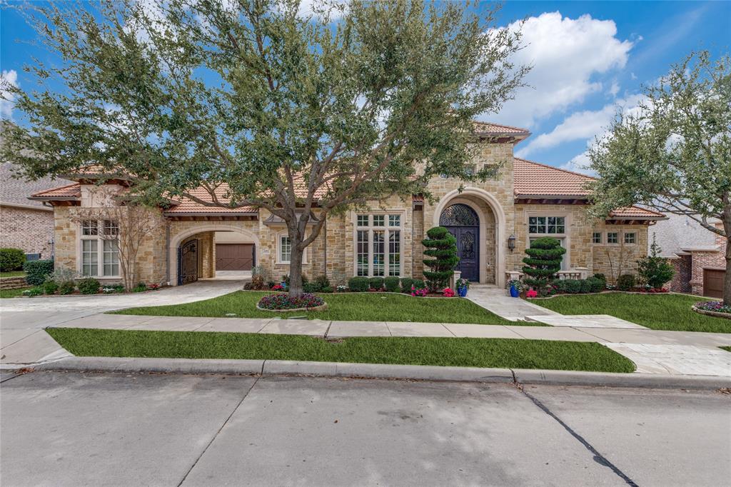 Builder’s personal home in sought-after gated & guarded Starwood, showcasing exceptional craftsmanship & attention to detail throughout. Perfectly positioned on a heavily treed greenbelt lot, this stunning residence offers breathtaking panoramic views & ultimate privacy.
From the grand entry, you’re immediately drawn to walls of windows that frame the resort-style backyard. Designed for both relaxation & entertainment, the outdoor oasis features a sparkling pool & spa, a spacious covered veranda w fireplace, electric remote screen, a convenient outdoor pool bath, all surrounded by lush landscaping for complete seclusion. The elegant formal living rm offers a fireplace & serene backyard views, while the formal dining rm is complemented by an impressive wine room. A private study w built-ins & French doors opens to the front of the home, creating the perfect work-from-home space. The guest suite is conveniently located on the main floor & features its own ensuite bath. The chef’s kitchen is a showpiece, highlighted by a large island, high-end appliances, & a built-in Sub Zero refrigerator. It opens seamlessly to the spacious family rm w striking wood-beamed ceilings, a fireplace, and walls of windows overlooking the backyard retreat. The expansive primary suite is also located on the main level & opens to the backyard, offering a luxurious bath & an oversized walk-in closet w custom furniture-style cabinetry. Upstairs you’ll find a media rm, a large game rm w walk-in wet bar, & a versatile bonus rm perfect for a second office or workout space. Three generously sized bedrms complete the upper level. Additional highlights include three tankless water heaters, a powerful 26k Generac whole-house WiFi-enabled natural gas generator, overhead garage storage, security cameras, security lighting, outdoor recessed decorative lighting & spotlights, & an expansive porte-cochere w large driveway. The home is also Green Built certified & designed for exceptional energy efficiency.