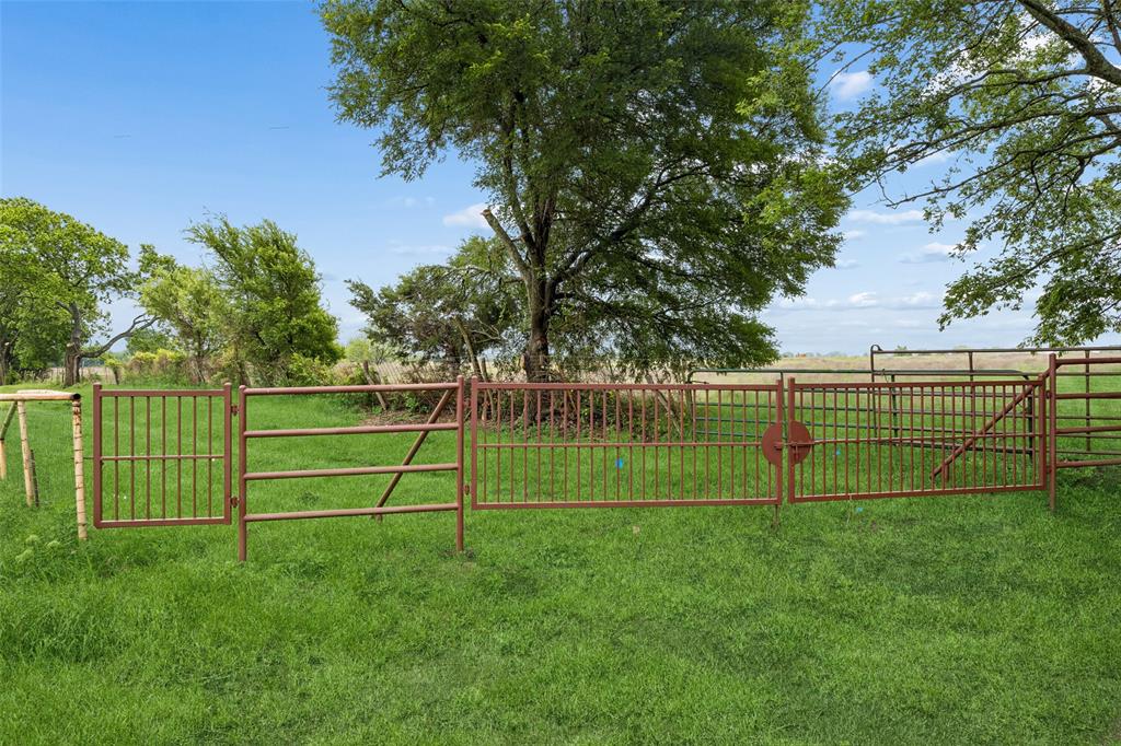 Perfect opportunity for peaceful country living and forward looking investment potential with this exceptional 9.2 acre property in Bonham. Located at St. James Place on CR 4130, this offering includes two contiguous tracts (approximately 0.6 acres and 8.6 acres) that must be sold together, creating a rare opportunity to own a sizable piece of land in rapidly growing Fannin County.

Ideally positioned just minutes from local shopping, dining, and medical facilities, this piece of land also offers a convenient commute, less than an hour to McKinney and approximately 30–40 minutes to Sherman, making it an excellent option for those seeking both accessibility and a quieter rural setting. The land features gently rolling terrain with a beautiful mix of mature trees, open pasture, and scenic countryside views. With a secure 40 foot gated access roadway and manual pedestrian gate, this location offers both privacy and flexibility for a variety of uses, including building a custom home, establishing a homestead, agricultural use, or recreational enjoyment. This land currently holds an agricultural valuation, helping support lower property taxes.

Adding to its appeal, this fantastic  acreage is located near some of North Texas’ most exciting growth and recreation areas, including Lake Bonham and the newly opened Bois d'Arc Lake, known for fishing and outdoor activities. The upcoming Lake Ralph Hall, expected to fill in 2026, along with nearby developments like Powder Creek Ranch, continue to drive demand and future value in the area.

Whether you're looking to build, invest, or enjoy the space and freedom of rural Texas, this property offers a versatile and well located opportunity in an area poised for continued growth.  Acres 8.600 (Tract Two) & Acres 0.606 (Tract One), Abst A0892, A0892 J PENNINGTON, ACRES 8.6 & ACRES 0.606 Total of 9.206 Acres (CR 4130 Bonham).  Mortgage options may be available for qualified buyers. This property is land only.