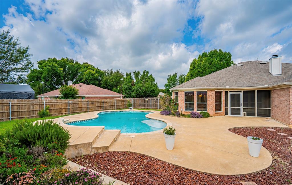 Welcome to your own private backyard retreat in highly desirable Meandering Estates! This hidden gem is ready for your personal touch and offers 4 bedroom, 2 baths, plus a separate pool house featuring a 3rd full bath with convenient pool access—perfect for entertaining.  

Designed for everyday living, the open-concept floor plan is filled with natural light from walls of windows overlooking the sparkling in-ground pool. The spacious living room is anchored by a striking floor-to-ceiling stone fireplace, creating a warm gathering space. The kitchen flows seamlessly into the main living area and features abundant cabinetry, generous counter space, a center island, and a stainless steel refrigerator that conveys.

The versatile 4th bedroom, currently used as a home office, features elegant French doors off the entry and easily functions as a guest room, hobby room, or dedicated workspace. The split-bedroom layout offers privacy for the spacious primary suite with dual sinks, soaking tub, separate shower, and large walk-in closet.

Step outside to discover where this home truly shines! The resort-style backyard features a sparkling in-ground pool with diving board, multiple patios, and a covered brick outdoor living area perfect for cookouts, game days, or relaxing after a long day. The detached pool house (split between bathroom and pool equipment) has new plumbing and includes a full bath with direct pool access, keeping wet feet out of the main house.

Additional amenities include an oversized 3-car garage with room for vehicles, a golf cart, workshop space, extra storage, and a utility sink.

Whether you’re hosting unforgettable summer pool parties, enjoying morning coffee under the covered patio, or relaxing beside the stone fireplace on a cool Texas evening, this home offers the perfect blend of comfort, functionality, and outdoor living. Opportunities like this are rare—don’t miss your chance to make this property your own!