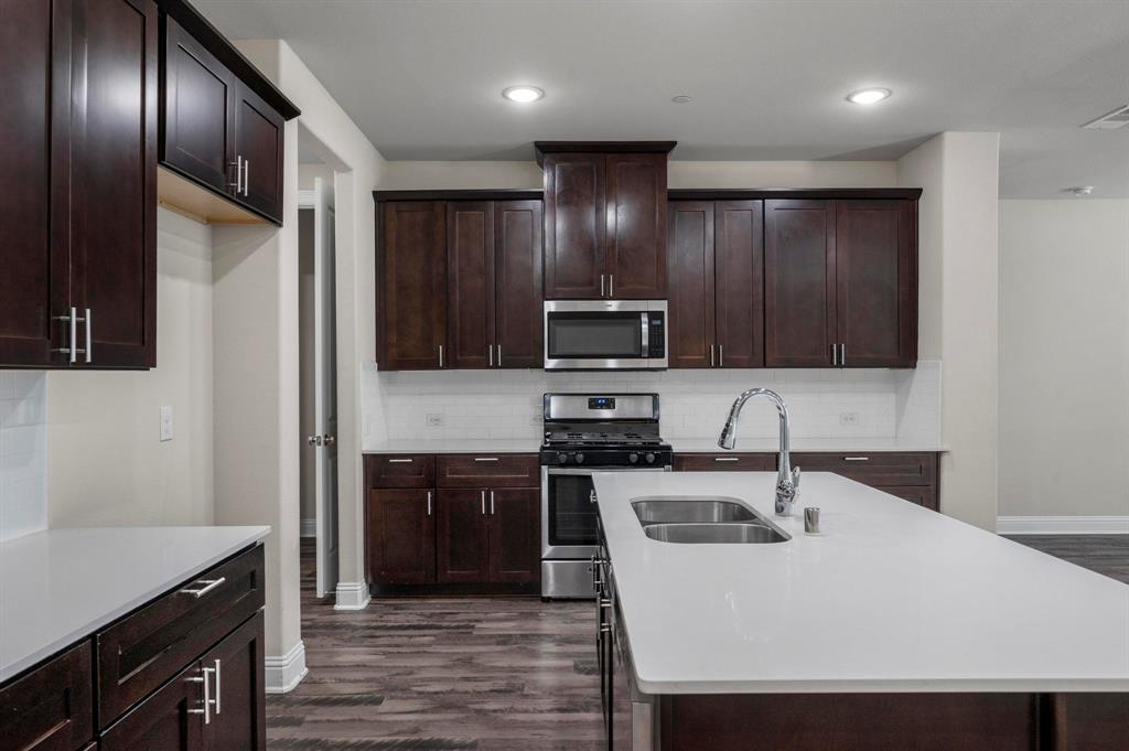 Welcome to this beautifully maintained, centrally located home in Allen! Offering 4 bedrooms, 3.5 bathrooms, and over 2,000 square feet of light-filled living space, this home perfectly blends comfort and style. The main level showcases stunning luxury vinyl plank flooring and an open-concept layout ideal for everyday living and entertaining. The kitchen features solid wood cabinetry, updated granite countertops, a gas range, and a spacious pantry. A convenient half bath is located just off the garage entry. Upstairs, you’ll find four generously sized bedrooms, each with ample closet space. The primary suite offers a spacious retreat with a large walk-in closet and an open ensuite bath complete with dual sinks and a stand-up shower. The upstairs utility room provides added convenience with room for a full-size washer and dryer. Additional highlights include a spacious two-car garage with extra storage space and a sizable backyard perfect for pets, play, or entertaining — complete with a covered patio for year-round enjoyment. The home is equipped with a fire suppression system, which may help reduce homeowners insurance costs. Even better, the HOA covers the entire exterior of the home, including the roof, foundation, and irrigation, offering added peace of mind and low-maintenance living. Don’t miss this exceptional opportunity to enjoy comfort, convenience, and modern living in the heart of Allen!