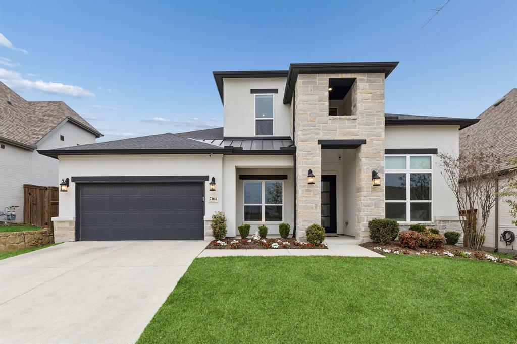 Located in Walsh within Aledo ISD, this exceptional Toll Brothers home was thoughtfully designed for those who appreciate quality, craftsmanship, and lasting value. Built in 2021 with more than $264,000 in builder upgrades, every detail was carefully selected to create a home that stands apart from typical builder inventory.

Offering 4 bedrooms and 4.5 bathrooms, each bedroom features its own private bath, while expanded living spaces provide room to live, work, and grow. The custom media room, spacious game room, upgraded cabinetry, premium countertops, designer finishes, and extensive flooring upgrades reflect a level of investment rarely found in comparable homes.

Beyond the finishes, this home was designed with the future in mind. The covered patio is stubbed for a future outdoor kitchen, the backyard is pre wired for a pool, and the property backs to green space with no rear neighbors, creating both privacy and flexibility for years to come.

Living in Walsh means access to an unmatched lifestyle, including multiple resort-style pools, two dog parks, and a state-of-the-art fitness center featuring a drop-in daycare and weekly classes. Residents also enjoy the Makerspace, complete with a woodworking shop and 3-D printer, along with miles of hike and bike trails, parks, playgrounds, tennis, pickleball and basketball courts, and a vibrant community atmosphere. HOA dues include front yard maintenance and high-speed internet, and a dedicated community lifestyle director plans events throughout the year. An on-site elementary school and convenient access to Fort Worth make it easy to balance work, recreation, and everyday living.

For buyers seeking a home that combines thoughtful design, exceptional upgrades, and long-term value, 2164 Domingo offers a rare opportunity within one of Walsh’s most desirable locations.