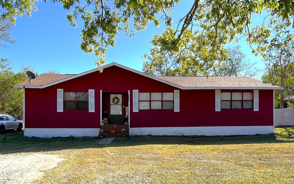 Nice size corner lot, just one block from the park!  3 bedroom 2 bath frame home with central heat & air.  The entry opens to the living room with the kitchen & dining area close by.  Dining area is large & can accommodate a table plus a hutch or china cabinet & is open to the kitchen.  Side door access for easy grocery unloading directly into the kitchen.  Refrigerator, Stove, Microwave, Washer & Dryer are included.  All bedrooms are off a central hall.  Hall bath with tub & shower combo.  Primary bedroom with ensuite bath with tub & shower combo.  The roof was replaced approximately five yrs old.
