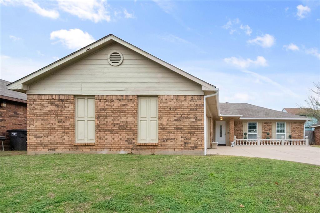 Fully remodeled 3 bedroom, 2 bath home with an open floor plan connecting the kitchen, dining, and living areas. The kitchen features marble countertops and a large island, while the living room offers a beautiful electric fireplace. The spacious primary suite includes an updated bathroom with a large stand up shower. One bedroom includes built in shelves and a desk, perfect for a home office. Enjoy the large covered patio with a built in grill and two ceiling fans, overlooking a well maintained backyard with a full wood privacy fence.