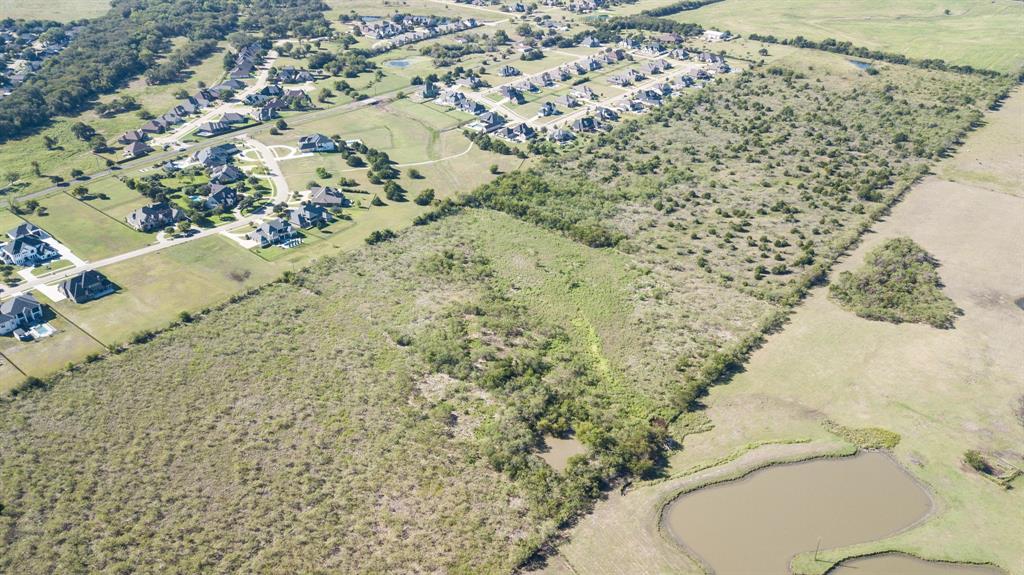Calling all builders and developers! Great opportunity to develop and-or build on over 50 acres in Ennis. Land is not yet annexed and will be buyers responsibility to complete. This is a blank slate and is flexible to be developed, kept as raw land, single family, etc. City will consider development for R-1 lots, 7k sq ft minimum, or R-10 lots, 10k sq ft minimum- multifamily not considered. Buyer to confirm with city for final plans and proposed use. All draft engineering, traffic study, surveying, design maps and working documents will be provided at contract after EM is deposited. Buyer and buyers agent to do their own due diligence & confirm acreage, easements, restrictions, proposed use, schools, etc. Property does not currently have utilities.