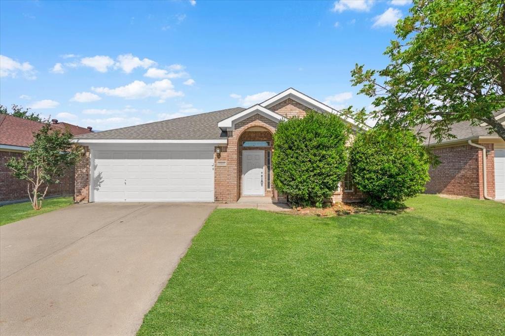 Welcome to this beautifully maintained Fort Worth home featuring an inviting open-concept layout, soaring vaulted ceilings, and abundant natural light throughout. From the moment you step inside, you’ll appreciate the spacious living and dining areas enhanced by updated flooring, neutral tones, and large windows that create a bright and airy atmosphere. The heart of the home is the expansive kitchen, complete with granite countertops, ample cabinet storage, stainless steel appliances, and a center island perfect for meal prep or casual entertaining. The kitchen flows seamlessly into the main living area, where a cozy brick fireplace creates the perfect focal point for relaxing evenings at home. Retreat to the oversized primary suite offering generous space, vaulted ceilings, and private French door access to an adjoining flex room that would make an ideal home office, nursery, workout room, or sitting area. The ensuite bath features dual vanities, a soaking tub, separate shower, and an oversized walk-in closet. Additional bedrooms provide comfortable accommodations with great natural light and versatile functionality. Step outside to enjoy the private backyard with mature trees and room to entertain, garden, or simply unwind. Conveniently located in Fort Worth near shopping, dining, schools, and major commuter routes, this move-in-ready home combines comfort, functionality, and timeless appeal in one exceptional package!