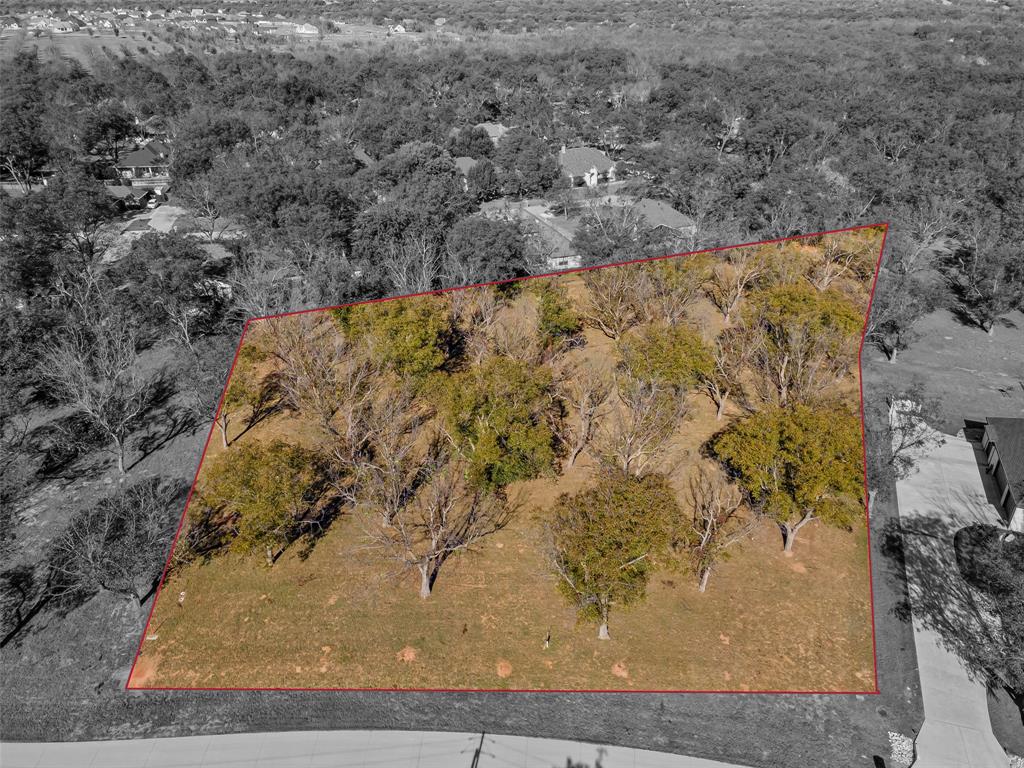 Large (1.4 A) lot in The Landings at Pecan Plantation, offering many mature Pecan trees, and elbow room to build your dream home. Lot measures 154 x 229 x 190 x 367. Development is complete with concrete roads, electric service, MUD water & sewer. Homeowners can also take advantage of Orchard irrigation; high speed internet is available. 2,000 SF minimum in this section of Pecan. Owner may use builder of choice. Mandatory HOA membership. PPOA Membership initiation fee to be paid by Buyer at closing.