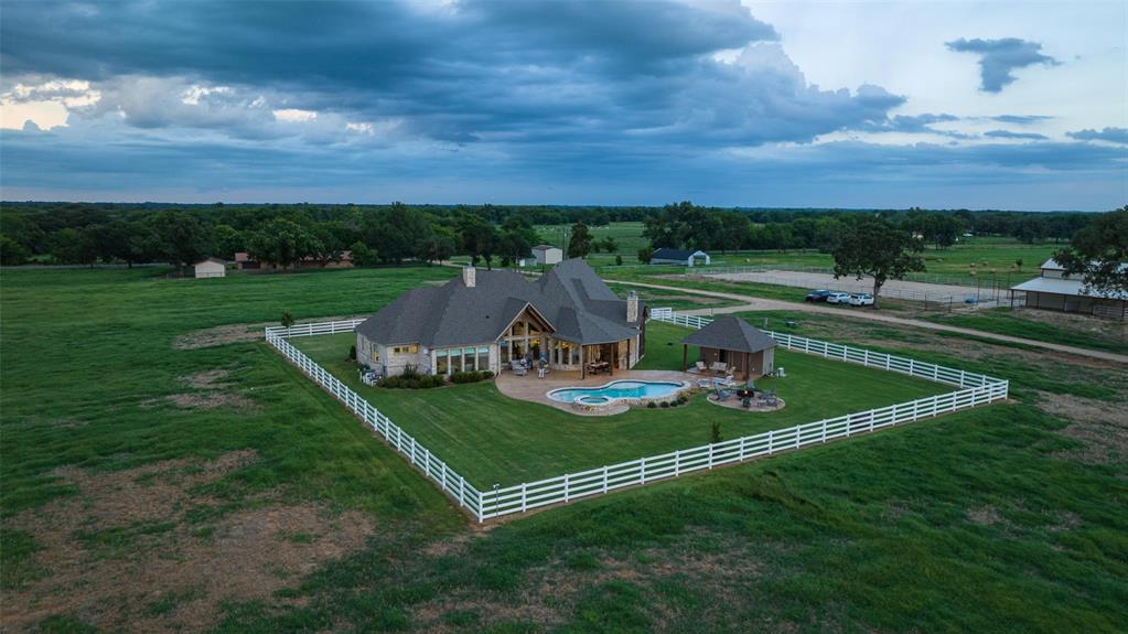 El Retiro Ranch, which translates to “The Retreat Ranch”, is a fitting name play on a place where one can slow down and enjoy all the wonderment and beauty that this property has to offer. Conveniently located within an hour and a half of Dallas, TX, and five minutes from the boat ramp at Lake Fork, this 227 +- acre ranch is an easy withdraw to relaxation and recreational delight. Currently being run as a successful cattle and hay operation, this property also offers top notch accommodations to go along with a multitude of leisure activities such as fishing, hunting, horseback riding, swimming, and so much more. El Retiro Ranch is a well-maintained multi-purpose property ready for the outdoor lover.