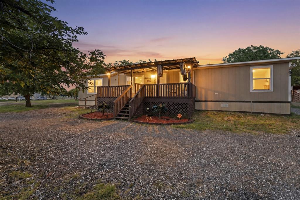 Welcome to this beautifully maintained double-wide manufactured home offering 1,456 square feet of comfortable living space in pristine condition! Featuring 4 bedrooms and 2 bathrooms, this spacious home provides the perfect blend of comfort, functionality, and affordability.

Situated on a 0.23-acre lot with no known restrictions, you'll enjoy the flexibility and freedom that can be hard to find. The property also features additional parking behind the home, making it ideal for multiple vehicles, trailers, boats, or guests. Need extra room for your belongings? You'll appreciate the additional storage spaces that provide plenty of room for tools, equipment, and seasonal items.

One of the standout features of this property is its financing flexibility. Because the home has only been moved once, it qualifies for FHA and VA financing, creating more opportunities for qualified buyers to achieve home-ownership.

For those looking for additional space or future investment potential, there is also an option to purchase the adjacent lot next door, providing even more possibilities. The home's pristine condition showcases the care and pride of ownership throughout, making it truly move-in ready from day one.

Whether you're a first-time home buyer, growing family, or someone looking for an affordable home with room to spread out, this exceptional property offers outstanding value, flexibility, and future potential. Don't miss your chance to own this move-in ready home with additional parking, extra storage, and the rare opportunity to expand with the neighboring lot.