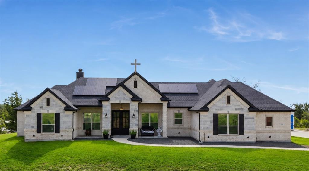 Situated prominently upon the highest elevation, this exceptional custom-built hilltop home offers breathtaking panoramic sunrise and sunset views that simply cannot be duplicated. Every day feels like a retreat as you arrive home to this stunning property! Soaring cathedral-arched ceilings create a grand sense of space throughout the family and primary suite, with luxury wood-look ceramic flooring through much of the home.
Gourmet chef's kitchen is designed to impress with custom cabinetry, & abundant workspace. The purposefully designed butler's pantry and serving area for additional storage are to the side of the spacious kitchen and the ideally positioned laundry room connects directly to the spacious primary closet. A thoughtfully crafted mudroom right off the garage.  Appreciate the fully foam insulated workshop with ample electric, & extra parking space for trailer, RV, boats etc. The seller had curbs installed on the wide driveway up to the home and shop. This remarkable property combines luxury, efficiency, functionality, and unmatched views—truly checking every box for your last forever home! The home is updated w solar energy offering significant utility savings. The seller likes to keep his home cool & around 68 degrees, with the solar panel ownership contract and co-op electric, he pays around 250-275 on avg per month. Buyer will assume the existing solar contract at closing, w ownership of the solar panels transferring upon completion of term. OR Seller will consider removing panels if buyer does not want them.  2 huge private safes in living stay with home, or can be removed if buyer wants. Buyer and BA to verify all info during due diligence period to include schools, measurements etc. Priced below a recent independent appraisal. Copy is available from the listing agent upon request. Per seller, No building restrictions, would only need permit from city of Reno. Also, The cross was installed by the builder and can be removed if buyer does not want.