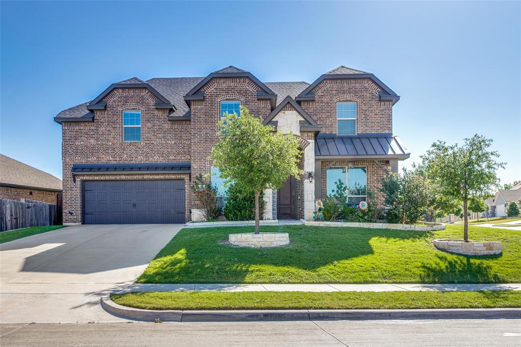 Welcome to this stunning two story home offering 4 bedrooms and 3.5 bathrooms, perfectly designed for comfort and entertaining. The private primary suite downstairs provides a relaxing retreat, while upstairs features spacious secondary bedrooms and a versatile game room that can easily serve as a second living area. The heart of the home is the beautifully appointed kitchen, complete with stainless steel appliances, a gas stove, granite countertops, and a large island ideal for gathering with family and friends. The open concept design flows seamlessly into the living room, where vaulted ceilings and a cozy fireplace create a warm, inviting atmosphere. A dedicated coffee bar and generous counter space add both charm and convenience. Situated on a desirable corner lot, this home offers added space and curb appeal, all while being conveniently located near top rated schools, shopping, and a quick commute to downtown Fort Worth. This is a home you won’t want to miss!