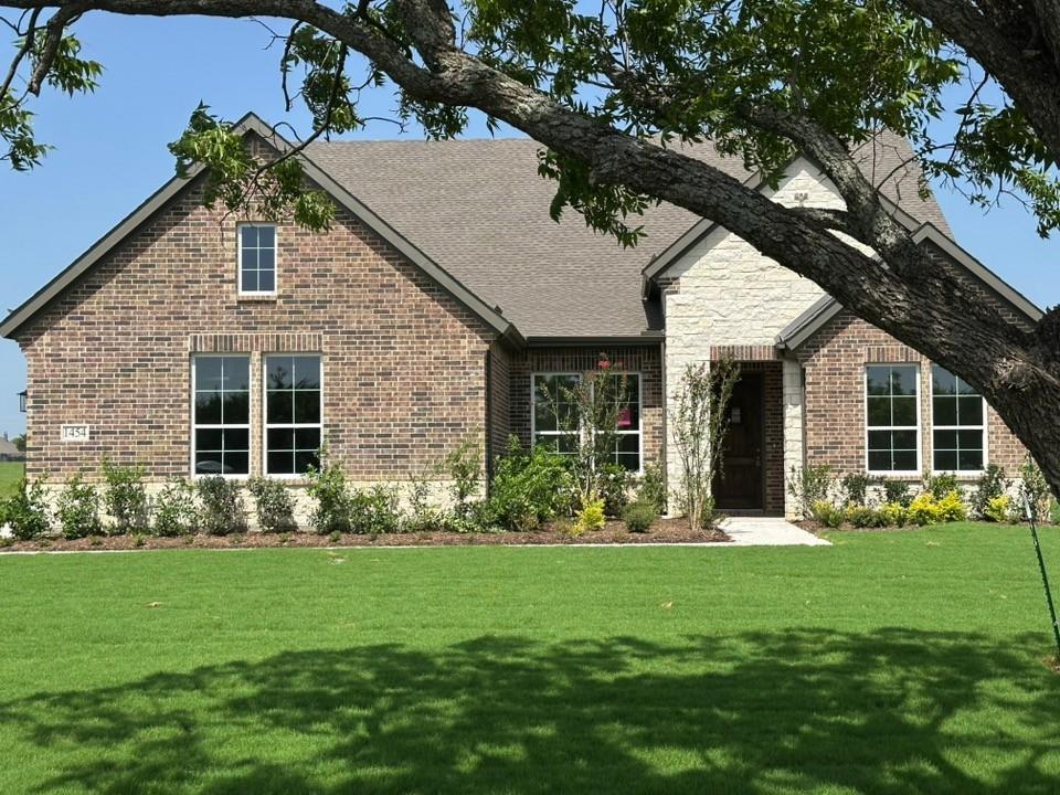 Estimated July 2026 completion! Ask about our Trade-In Trade-Up Program, we can buy your home when you buy ours! Premium corner homesite! Step into the Bluebonnet by Riverside Homebuilders and embrace a lifestyle of comfort and functionality. With 4 bedrooms and 3 bathrooms sprawled over 2,686 square feet, this single-story haven offers ample space for every member of the family. As you enter through the inviting porch, the airy foyer sets the tone for the home's open layout. To the left, a flex room awaits, beckoning to be transformed into your ideal space—whether you envision a home office, gym or hobby room. Continue through the foyer to discover the heart of the home—a luminous dining room bathed in natural light. Beyond lies the main living area, a seamless fusion of the expansive kitchen, cozy family room featuring a fireplace and a charming nook adorned with picturesque windows. On the right wing of the home, privacy awaits with three traditional bedrooms and a breathtaking owner's suite. The owner's retreat boasts a spacious walk-in closet and a spa-like bathroom, offering a sanctuary for relaxation. Convenience is paramount with the laundry situated just off the bedrooms, accompanied by a mud bench near the garage entrance. To embrace the beautiful DFW weather without having to leave your home, step outside to the generous covered patio—where endless possibilities for outdoor enjoyment await. With its thoughtful design and inviting atmosphere, the Bluebonnet embodies the epitome of charming Texas living for all families alike.