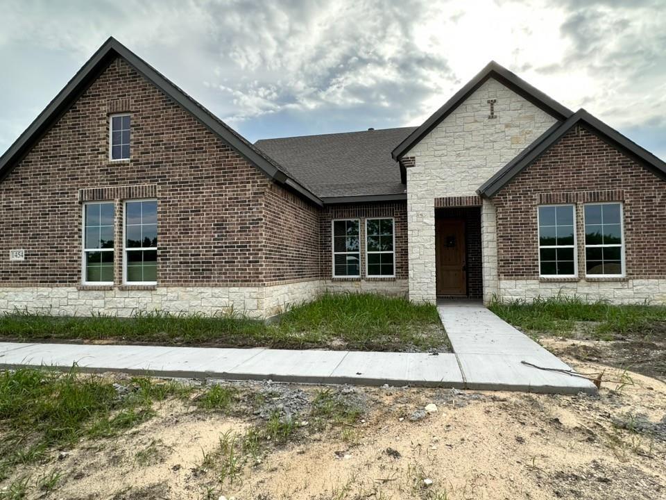 Estimated July 2026 completion! Ask about our Trade-In Trade-Up Program, we can buy your home when you buy ours! Premium corner homesite! Step into the Bluebonnet by Riverside Homebuilders and embrace a lifestyle of comfort and functionality. With 4 bedrooms and 3 bathrooms sprawled over 2,686 square feet, this single-story haven offers ample space for every member of the family. As you enter through the inviting porch, the airy foyer sets the tone for the home's open layout. To the left, a flex room awaits, beckoning to be transformed into your ideal space—whether you envision a home office, gym or hobby room. Continue through the foyer to discover the heart of the home—a luminous dining room bathed in natural light. Beyond lies the main living area, a seamless fusion of the expansive kitchen, cozy family room featuring a fireplace and a charming nook adorned with picturesque windows. On the right wing of the home, privacy awaits with three traditional bedrooms and a breathtaking owner's suite. The owner's retreat boasts a spacious walk-in closet and a spa-like bathroom, offering a sanctuary for relaxation. Convenience is paramount with the laundry situated just off the bedrooms, accompanied by a mud bench near the garage entrance. To embrace the beautiful DFW weather without having to leave your home, step outside to the generous covered patio—where endless possibilities for outdoor enjoyment await. With its thoughtful design and inviting atmosphere, the Bluebonnet embodies the epitome of charming Texas living for all families alike.