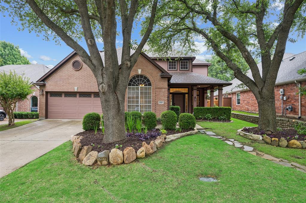 Welcome home, where timeless charm meets everyday functionality in this beautiful home surrounded by trees & resort-style amenities. From the inviting front porch to the private backyard retreat, this home offers exceptional flexibility, comfort, & space for the way you live today. The spacious living room features hardwood floors, custom built-ins, a cozy fireplace, & windows overlooking the backyard & pool. The layout flows seamlessly into the kitchen, complete with granite countertops, SS appliances, abundant cabinetry, & an island with cooktop—perfect for entertaining or gathering with family. The breakfast area & sunroom are filled with natural light & offer tranquil views of the outdoors. The home also features a formal dining room & an incredibly flexible floor plan. The downstairs secondary bedroom is currently being used as an office & could easily function as a guest room. The sunroom offers endless possibilities as a playroom, sitting room, hobby space, or additional workspace. Upstairs, the primary suite is a true retreat with vaulted ceilings & a dramatic wall of mirrors. The recently updated primary bath features beautiful tile flooring, a frameless glass shower, jetted soaking tub, & linen closet. Three additional bedrooms upstairs provide plenty of room for family or guests. Hardwood stairs add warmth & character to the home’s design. Step outside & enjoy your own private oasis featuring a Foley Custom Pool complete with water feature, heating capability, & safety gate. The covered patio is ideal for relaxing or entertaining, & the Weber grill—already connected to the home’s gas line—stays with the property. Additional updates include foundation work completed in 2026 with a transferable warranty for added peace of mind. Located just a short walk from community amenities including pickleball, neighborhood pool, sand volleyball, fishing pond, jogging trails, & BB courts, this home offers the perfect blend of comfort, flexibility, & community living.