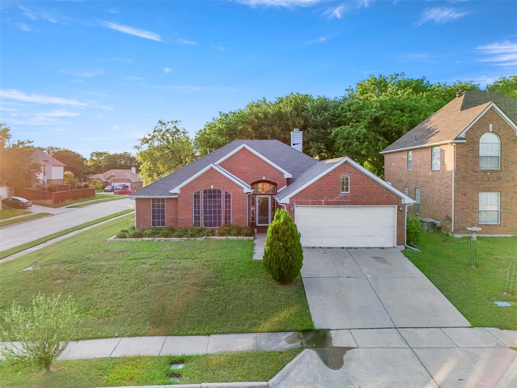 Welcome to a home that gives you the space to grow, entertain, and truly settle into the lifestyle you’ve been searching for. Situated on a large corner lot in the established Wind Ridge subdivision, this thoughtfully renovated 4-bedroom, 2-bath home blends comfort, functionality, and everyday convenience.

Inside, you’ll immediately appreciate the spacious layout designed for both relaxing evenings and effortless entertaining. The expansive living area flows seamlessly into the kitchen, where an extended island, wet bar, and open sightlines create the perfect setup for hosting family or casual relaxation. Natural gathering spaces continue with both a formal dining room accented by a chandelier and a bright breakfast area ideal for morning coffee or busy weekday routines.

The oversized primary suite offers a peaceful retreat with a separate shower and plenty of room to unwind at the end of the day. Three additional spacious bedrooms provide flexibility for growing families, guests, home offices, or hobby spaces. Thoughtful updates throughout the home help create a move-in ready experience so you can spend less time worrying about projects and more time enjoying your new space.

Outside, the large corner lot gives you extra breathing room and endless possibilities for outdoor living, play, gardening, or future customization. The location offers quick access to I-20 and Highway 408, making commuting across the DFW metroplex simple and convenient. Whether you’re a first-time homebuyer, relocating to DFW, or simply looking for more space to fit your lifestyle, this home delivers the comfort you’ve been waiting for.