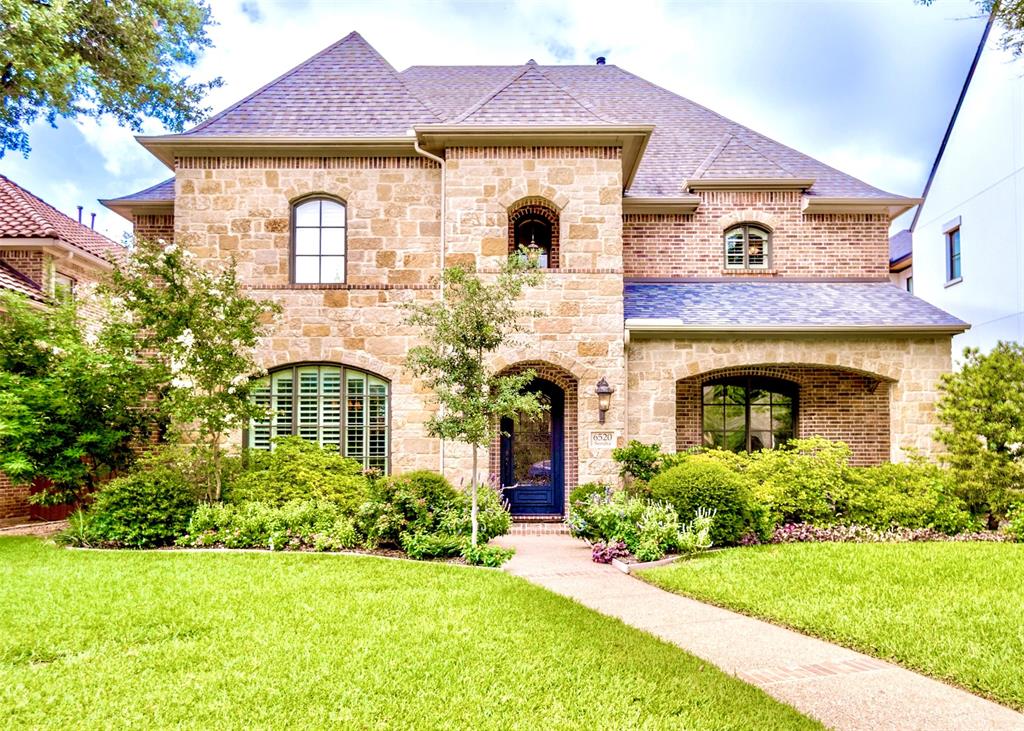 Located in the heart of Lakewood, this exceptional home offers sophisticated design, expansive living spaces, and an unbeatable location just two blocks from Lakewood Elementary and one mile from White Rock Lake. Soaring 25-foot ceilings in the entry and living room, paired with a wall of windows, fill the home with abundant natural light and create a stunning first impression.

Designed for both everyday living and effortless entertaining, the thoughtfully crafted floor plan features a first-floor study with a handsome coffered wood ceiling, making it an ideal home office or elegant sitting room. The spacious living areas flow seamlessly into the heart of the home, while the upstairs game room with wet bar and adjoining media room, complete with an overhead projector, provide the perfect setting for movie nights, game days, and entertaining family and friends.

The private primary suite is a true retreat, highlighted by a raised ceiling, a luxurious bath, and a 14' x 12.5' walk-in closet featuring natural light and a window seat.

Step outside to a beautifully landscaped backyard designed for year-round enjoyment. Low-maintenance artificial turf, complete with a dedicated putting green, creates a lush setting, while the covered patio with a gas-enabled wood-burning fireplace extends the living space outdoors and provides the perfect gathering place on cool Texas evenings.

Blending timeless architecture with exceptional functionality, this beautifully appointed home offers the rare opportunity to enjoy spacious luxury living in one of Dallas' most sought-after neighborhoods, just moments from White Rock Lake, premier shopping and dining, and everything that makes Lakewood one of the city's most desirable places to call home.