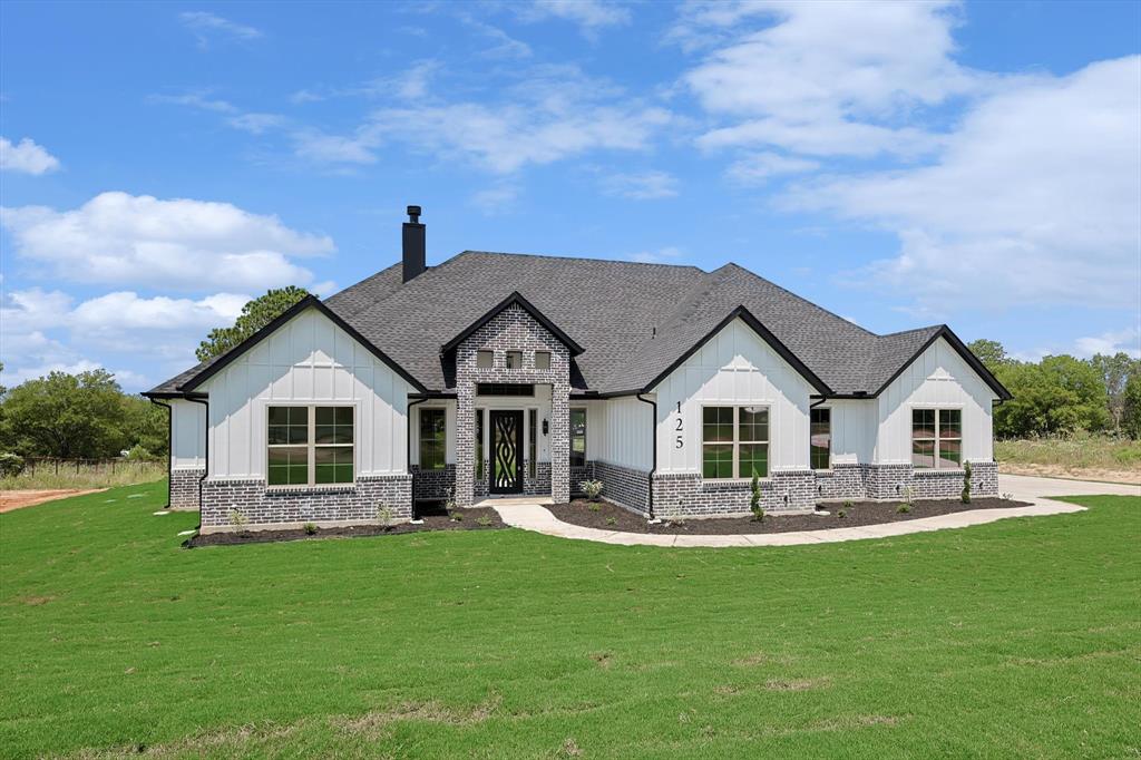 This exquisite corner lot modern farmhouse house offer the perfect combination of modern luxury and serene country living. Away from the hustle and bustle of city living. luxurious finishes; plenty of cabinet space, waterfall island, high-end countertop, huge walking closet, outdoor fireplace, high-end iron front door and much more. NO city tax, no HOA
Owner finance available for qualified buyer.