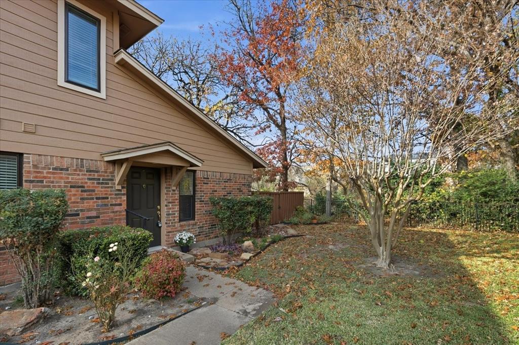 Enjoying privacy, quiet location, and a lovely view of the wooded area and small creek and green area. This townhome is not to be missed! Instead of overlooking a parking lot, this unit is rear-facing in the cul-de-sac to the east of the main gate. Centrally located near Waterside, Fort Worth Country Day School, Clear Fork, and major arteries making easy work of any destination. Open design, freshly painted, granite countertops in kitchen and bathrooms, woodburning fireplace, full size utility area and a delightful courtyard patio overlooking the creek and woods. Windows were recently replaced. (Big plus!) 
There is a primary bedroom with ensuite bath on the ground floor.  If one prefers to sleep with a treetop view, there are two additional bedrooms on the second floor with a shared hallway bathroom. The washer, dryer, and refrigerator are included in the sale. There is one assigned covered parking space, with additional parking for guests. There's also a community swimming pool and small clubhouse, and easy access to the Trinity Trail system. Convenient, low-maintenance, peaceful environment, amenities - this is a winner!