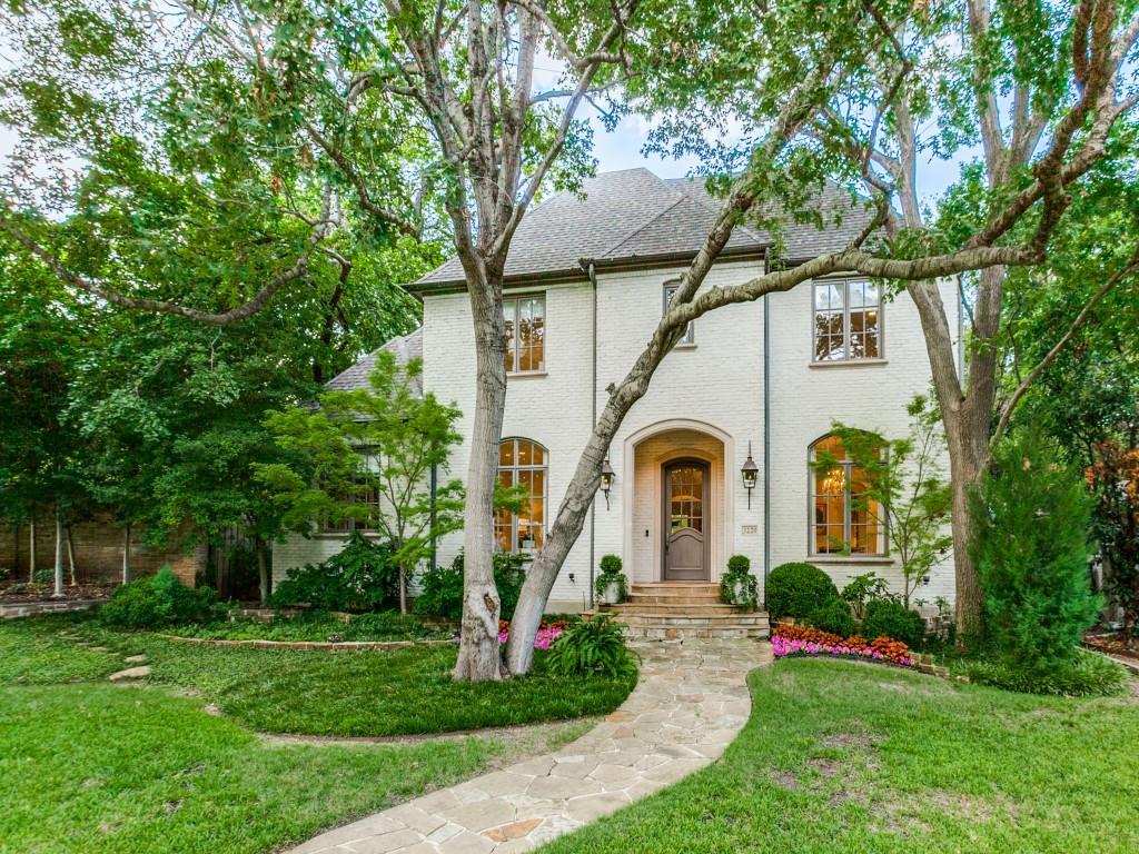 University Park home nestled on 70x150 lot within the prestigious Highland Park ISD. Bright and inviting with 11-foot ceilings, big windows and stunning appointments throughout. This elegant property features exquisite formal living and dining spaces, perfect for sophisticated entertaining. The first floor offers a seamless flow, including flexible office space with built-ins and full bath, making it a great option for guests or 5th bedroom. Chic bar area and gourmet kitchen equipped with top-of-the-line appliances, center island, and butler's pantry. The inviting family room opens up to deep covered porch and spacious turfed backyard surrounded by mature trees and landscaping. Upstairs, the luxurious primary suite is accompanied by three additional ensuite bedrooms, large laundry room and versatile playroom. Custom drapery throughout. This home offers a blend of refined luxury, modern amenities and access to some of the best schools in Dallas. Less than 2 blocks from Boone Elementary.